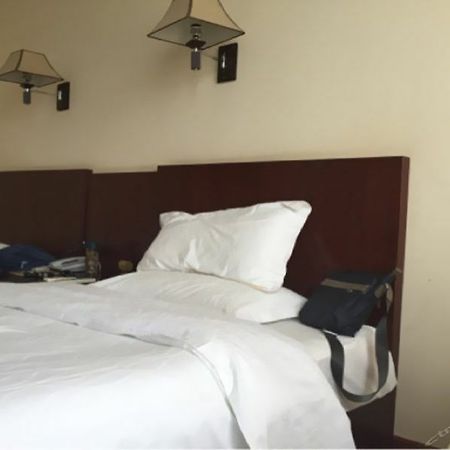 Gushen Hotel Mile Branch Honghe Екстериор снимка