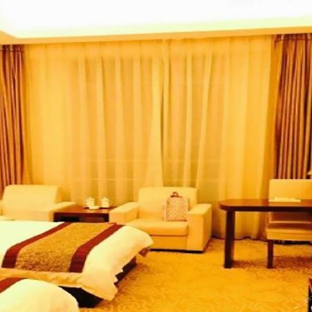Gushen Hotel Mile Branch Honghe Екстериор снимка